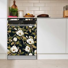 an image of a kitchen scene with focus on the dishwasher's floral design