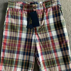 Ralph Lauren Multicolored Button Boy Shorts Size 10. New With Tag Casual Multicolor Bottoms With Button Closure, Casual School Bottoms With Button Closure, Ralph Lauren Summer Pants, Casual Ralph Lauren Summer Pants, Casual Plaid Bottoms With Button Closure, Casual Ralph Lauren Short-length Bottoms, Plaid Cotton School Bottoms, Yellow Cotton Bottoms For School, Ralph Lauren Casual Shorts With Pockets