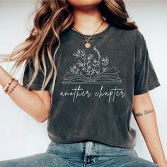 This "Another Chapter" shirt is perfect for yourself or to gift to any friend, coworker or family member! It is made of high-quality soft garment-dyed fabric and is so comfortable to wear all year round! PRODUCTION TIME: 1-3 business days (Usually 2 days) SHIPPING TIME: 1-5 business days (Usually 3 days)  We do not guarantee delivery times PRODUCT DETAILS: Our Relaxed Fit Tee (Bella + Canvas style 3001) is a unisex style. 100% soft cotton (fibre content may vary for different colors). Light fabr Bookish Cotton T-shirt With Custom Print, Bookish Crew Neck Shirt With Letter Print, Librarian Gifts, Book Nerd Shirts, Nerd Shirt, Reading Humor, Happy Shirt, Gifts For Librarians, Reading Shirts