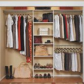 an organized closet with clothes, shoes and handbags