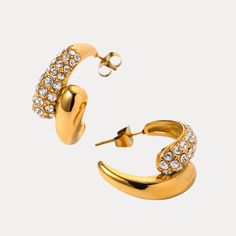 An extraordinary addition to your jewelry collection, these Twisted Half Circle Earrings are crafted from durable stainless steel and are sure to add a touch of elegance and sophistication to any outfit! With 18K gold plating, they are hypoallergenic, water resistant, and feature an oversized chunky style that makes a bold statement. Material: Stainless Steel (Gold-Plated) Gemstone: Cubic Zirconia Inner Diameter: 17 mm Outer diameter: 22 mm Thickness: 13 mm Weight: 6 g Luxury Full Circle Fine Jewelry, Half Circle, Circle Earrings, Gold Plating, Cubic Zirconia, Jewelry Collection, 18k Gold, Gold Plate, Water Resistant