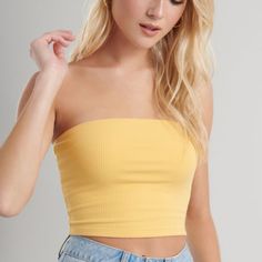 Brand New With Tags Yellow Tube Top From The Brand Garage 57% Cotton, 38% Rayon, 5% Spandex Machine Wash Cold Fitted, Ribbed Knit With Stretch Strapless Cropped Length (Hits Above The Belly Button) Seamless Casual Tube Top For Day Out, Trendy Ribbed Tube Top For Spring, Casual Yellow Seamless Tops, Trendy Ribbed Bandeau Top, Yellow Stretch Bandeau Top, Spring Seamless Bandeau Tops, Trendy Yellow Tube Top For Spring, Yellow Bandeau Top For Spring, Updated Closet