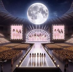 a group of women standing on top of a stage in front of a full moon