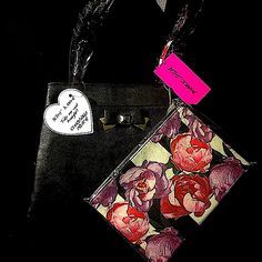 Betsey Johnson - Large Floral Print Shoulder Bag (Nwt) New. Unused With Tags Color: Black/Multi Materials: Synthetic Exterior;Textile Lining Dual Top Handles Too Zip Closure Includes Floral Print Pouch Exterior: Front & Back Compartments W/Magnetic Snap Closures, Floral Print & Bow Detail Approx: 10 H X 13.5” W X 4”D Approx: 10” Handle Drop Approx: 6.5” H X 9.5” W (Cosmetic/Make-Up Bag) This Shoulder Bag Is Adorned W/Floral Print & Includes A Pouch For Extra Organization! Wallets With Detachable Strap And Pouch Shape, Pouch Wallet With Detachable Strap As Gift, Wallet With Detachable Strap And Pouch Shape As Gift, Betsy Johnson Purses, Bow Purse, Betsey Johnson Purses, Glitter Bag, Envelope Purse, Betsey Johnson Handbags