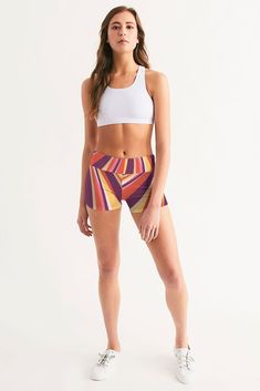 Made with stretch high-tech fabric, our sleek and fitting Women's Mid-Rise Yoga Shorts comfortably move with you. Handmade with exquisite stitching provides you a great fit from workouts to lounging around. Smooth, breathable fabric - Wicks away moisture - Comfortable waistband - Printed, cut, and handmade.