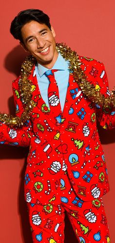 a man in a red suit with gold sequins on his shoulders and arms