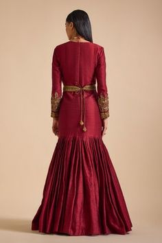 Maroon silk mermaid gown featuring sequin bead embellished sleeves and pleats. Comes with floral embroidered belt. - Aza Fashions Embellished Mermaid Hem Wedding Dress, Formal Floor-length Raw Silk Dress, Formal Raw Silk Floor-length Dress, Formal Floor-length Raw Silk Gown, Formal Anarkali Gown In Raw Silk, Formal Anarkali Raw Silk Gown, Satin Fishtail Wedding Dresses, Festive Gown With Sweep Train For Reception, Elegant Raw Silk Maxi Dress