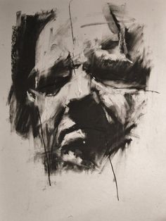 a black and white drawing of a man's face