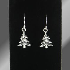 These are cute, quality-crafted, dainty ANTIQUE SILVER CHRISTMAS TREE earrings with garland accents and SOLID 925 (STAMPED) STERLING SILVER Ear Wires.   Hypoallergenic & Nickel Free Ear Wires     Christmas Jewelry  Festive Earrings 🎄 Drop Length:  1 1/4 inches  (32mm) Christmas Tree Charms: Height:   3/4 inch  (19mm) Width:     1/2 inch  (13mm) ❤️ Earrings are shipped with a pair of very comfortable, easy to use, silicone push backs. Solid 925 Sterling Silver (Stamped) Ball Dot Fish Earring Hoo Christmas Tree With Garland, Tree With Garland, Tree Charms, Antique Silver Earrings, Christmas Tree Charm, Silver Christmas Tree, Christmas Tree Earrings, Earring Tree, Silver Christmas