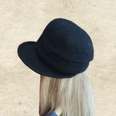 "This felted wool cloche hat is very warm. It's perfect to wear in fall/winter seasons. The hat is lightweight and easy to wear. It's well match with any outfits. One size fits most an average women's head (21.5\" - 22.5\") Composition: 100% Wool Hand wash in cold water and lay flat to dry. Do not use a dryer! NOTE Actual color may slightly different depending on your monitor. Please contact us if you have any questions for the color." Wool Brimmed Cloche Hat For Winter, Winter Wool Brimmed Cloche Hat, Winter Wool Cloche Felt Hat, Winter Wool Cloche Hat, Classic Felt Cap For Winter, Classic Winter Felt Cap, Adjustable Wool Brimmed Cloche Hat, Winter Wool Mini Hat With Curved Brim, Adjustable Brimmed Wool Cloche Hat