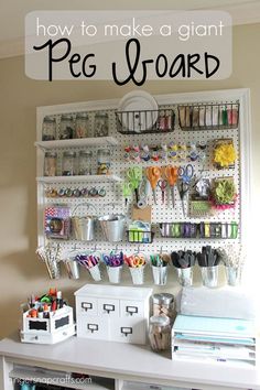 organized craft room with pegboard, scissors and other items on the wall behind it