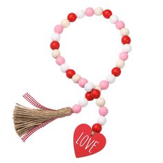 PRICES MAY VARY. 【Valentine's Day Wood Bead Garland】: Our farmhouse inspired Valentine's Day wood bead is done in beautiful muted tones of berry red, pink, natural wood and white, Interspersed with the jute & red buffalo plaid tassels and love heart shape embellishments. Will highlight the Valentine's Day and make you feel the strong Valentine's Day atmosphere 【Natural & Premium Quality】: This rustic farmhouse inspired love bead garland is made of natural wood beads and premium jute. The beads m Wooden Embellishments, Valentine Garland, Farmhouse Tiered Tray, Candle Wrap, Wooden Bead Garland, Valentines Day Photos, Heart Garland, White Love, Bead Garland