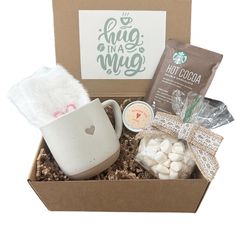 a box filled with coffee, marshmallows and other items