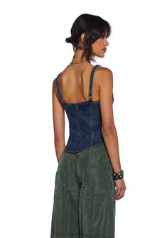 This corset top has a washed denim construction, adjustable shoulder straps, structured boning on the sides, a front lace lace-up design with ties on the front, and a back zipper closure. Dark Wash Denim Corset For Summer, Summer Dark Wash Denim Corset, Dark Wash Summer Corset, Summer Denim Corset With Corset Back, Casual Denim Blue Corset For Summer, Casual Denim Blue Summer Corset, Casual Denim Blue Corset, Sleeveless Denim Blue Corset, Casual Denim Blue Cotton Corset