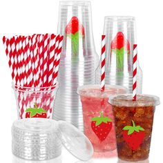 plastic cups with straws and strawberries on them