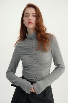 Lightweight fine knit Super soft with stretch Front ruched detailing Turtleneck design Discover ultimate comfort with our irresistibly soft and cozy top. Ideal for layering or standalone wear, its versatile design adds sophistication to any outfit. Casual Turtleneck Long Sleeve Top For Layering, Casual Long Sleeve Turtleneck Top For Layering, Elegant Ruched Tops For Layering, Fitted Tops With Ruched Sides For Fall, Chic High Neck Ruched Tops, Chic Ruched High Neck Tops, Fitted Ruched Tops For Winter, Casual High Neck Long Sleeve Top For Layering, Winter Fitted Ruched Tops