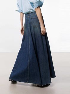 MO&Co. Women's A-line Maxi Denim Skirt This denim skirt features an A-line maxi silhouette, a flattering and versatile style that falls gently away from the body. Crafted from premium cotton, this skirt features a pleated and raw hem design that adds a unique and trendy touch, while the deep blue hue gives it a classic and timeless look. Pair with a cute top or tucked-in blouse for a chic outfit. Features : - Mid waist A-line maxi silhouette- Classic five pocket design- Pleated and raw hem desig Chic Wide Leg Cotton Denim Skirt, Full-length Denim Blue Maxi Skirt, Spring Dark Wash Wide Leg Maxi Skirt, Chic Dark Wash Denim Maxi Skirt, Flowy Denim Blue Denim Skirt, Spring A-line Denim Skirt, Full-length Denim Blue Skirt For Spring, Chic Denim Blue Wide-leg Maxi Skirt, Spring Denim Blue Full-length Maxi Skirt