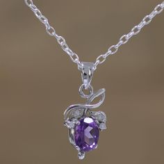 Weighing over two carats, a fruit of faceted lilac amethyst glistens in this necklace's pendant, elaborated with rhodium plated sterling silver leaf designs and petite cubic zirconia. Growing up in a family of artisans, Alok Jain presents the necklace, adorning the neck on sterling cable chain.