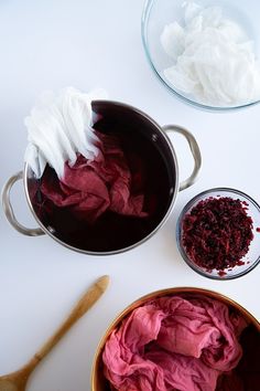 two bowls filled with red and white dye