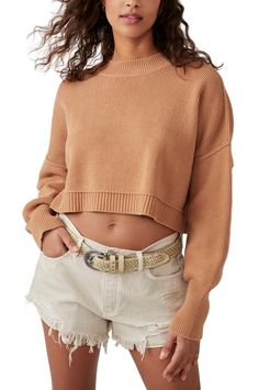 So cool and classic, this forever essential pullover sweater is featured in a slouchy, cropped silhouette and ribbed knit fabrication with mock neckline, defined seaming, and slightly exaggerated sleeves for added shape.Slouchy, cropped fitMock neckline, dropped shoulders, defined seaming, exaggerated hemsSure to be your top pick to pair with staple denim, a tailored trouser, or sweet skirt, this timeless pullover is the ideal throw-on-and-go sweater to add to your classics collection. Mens Beach Shirts, Crop Pullover, Exaggerated Sleeves, Camel Sweaters, Easy Street, Mock Neckline, Cozy Fits, So Cool, Latest Fashion For Women