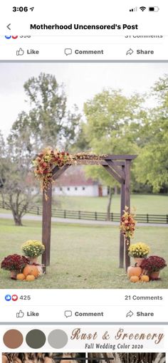 the wedding arch is decorated with flowers and pumpkins