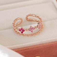 📌 Please Note: When adjusting the ring, please squeeze or expand the ring body slowly and gently. 💎 Materials: 14k Rose Gold Electroplated - more durable than regular platings Cubic Zirconia 📐 Size: Adjustable Open Design - Size 6+ Rose Gold Flower-shaped Rings With Cubic Zirconia, Rose Gold Flower-shaped Cubic Zirconia Rings, Adjustable Dainty Rose Gold Diamond Ring, Dainty Adjustable Rose Gold Diamond Ring, Adjustable Rose Gold Toe Ring, Adjustable Pink Flower Ring For Anniversary, Adjustable Rose Gold Flower Ring For Anniversary, Adjustable Pink Flower Shaped Rings, Adjustable Pink Toe Ring