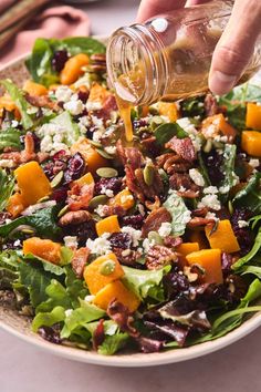 This Roasted Butternut Squash salad is perfect for fall and a great all year-round salad and perfect for lunchor as a side dish for your next dinner party or any event you are entertaining tooFresh salad greens of your choice tossed and topped with freshsweet roasted butternut squashtoasted or candied pecanscranberriesbaconcreamy goat cheese or fetared onionand finally drizzled with a quick and easy maple dijon dressing. Tofu Thanksgiving Recipes, Tofu Thanksgiving, Recipes For Dinner Party, Butternut Squash Salad Recipes, Dinner Party Salad, Roasted Butternut Squash Salad, Roasted Fall Vegetables, Autumn Salad Recipes