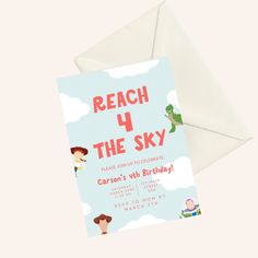 a birthday card with the words reach 4 the sky and cartoon characters on it, sitting next to an envelope