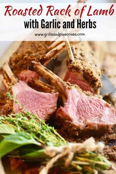 roasted rack of lamb with garlic and herbs on a cutting board in front of the words roasted rack of lamb with garlic and herbs