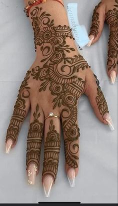 hendi tattoos on the palm of a woman's hand