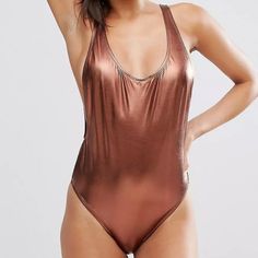 Bronze Golden Brown, One Piece Metallic Swimsuit, Size Small, Open Back, 2 Straps, Lined, No Padding In Bra Area Step Into The Summer Like A Bronze Goddess In This Flirty, Fun Metalic Swimsuit New Without Tags. Stretch Backless Swimwear For Festival, Beachwear Sleeveless Bodysuit With Lined Body, Beachwear Sleeveless Bodysuit For Pool, Sleeveless Bodysuit For Pool Beachwear, Sleeveless Beachwear Bodysuit For Pool, Stretch Beachwear Bodysuit For Festivals, Summer Sleeveless Bodysuit For Sunbathing, Sleeveless Summer Bodysuit For Sunbathing, Sleeveless Beachwear Bodysuit For Party