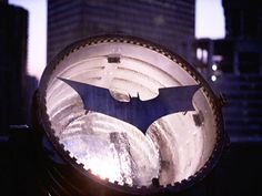 a close up of a batman symbol on a building