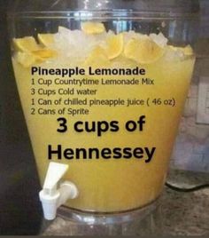 a blender filled with pineapple lemonade and 3 cups of hennessey