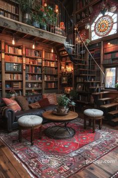 a living room filled with lots of furniture and bookshelves next to a spiral staircase