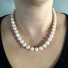 Freshwater Single Strand Bridal Pearl Necklace. This beautiful necklace is the epitome of class. One unique strand of hand strung and individually knotted pearls. The luster is very good. All of the pearls are beautifully matched for luster, color and overtone. 18 inch, with a sterling silver toggle clasp. Quality pearl necklaces are always knotted between the pearls. The necklace is double hand-knotted with silk thread. This protects the pearls from rubbing together and becoming damaged. All pe Hand-strung Round Pearl Necklace Gift, Elegant Hand-strung Round Pearl Necklace, Formal Hand-strung Pearl Necklace With Round Beads, Formal Hand-strung Round Bead Pearl Necklace, Dramatic Necklace, Double Strand Pearl Necklace, Beautiful Pearl Necklace, Bridal Pearl Necklace, Hematite Necklace