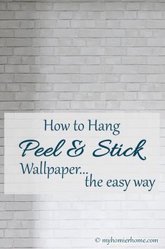 a brick wall with a sign that says how to hang peels and stick wallpaper the easy way