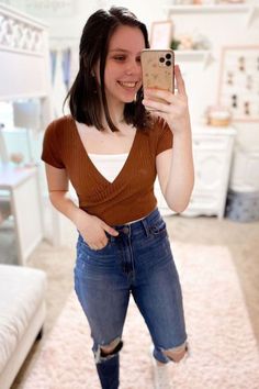 Love this rust colored wrap top with jeans. Today we've got a huge romwe clothing review with 21 romwe outfit ideas! This romwe haul has all the best romwe tops, romwe dresses, and even romwe skirts! This post also has all the cutest romwe outfits and even some romwe outfit teen fashion options! #romweclothes #romwehaul #romweoutfits Bodysuit Jeans