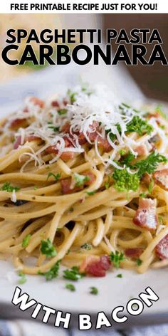 spaghetti with bacon and parmesan cheese served on a white plate for an advertisement