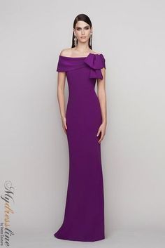 Looking for a show-stopping gown for your next big event? Look no further than the Frascara 4121. This gorgeous off-the-shoulder dress features a bow detail at the bodice and a fit and flare silhouette that is sure to turn heads. The hidden back zipper and satin lining make it both comfortable and chic. Made from 64% triacetate and 36% polyester, it's sure to be a favorite in your wardrobe. Off Shoulder Long Dress, Velvet Clutch, Empire Waistline, Long Evening Gowns, Plain Design, Boat Neckline, Crepe Fabric, Bow Detail, Dress Details