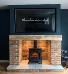 a fireplace with a tv mounted above it