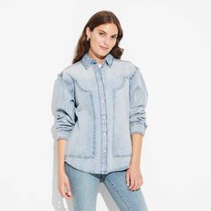 Western denim shirt from Wild Fable™ in an oversized silhouette. Features intricate stitch detailing and designed with a collared neckline. 100% cotton fabric offers soft and breathable comfort. Front button down style for versatile styling. If you're not satisfied with any Target Owned Brand item, return it within one year with a receipt for an exchange or a refund. Wild Fable™: A look for every story. Relaxed Fit Chambray Denim Top With Collar, Fall Washed Denim Top With Relaxed Fit, Trendy Collared Chambray Denim Top, Trendy Collared Cotton Denim Top, Light Wash Washed Shirt For Fall, Fall Denim Top With Relaxed Fit, Trendy Chambray Collared Denim Top, Relaxed Fit Cotton Denim Top For Fall, Oversized Denim Top For Fall