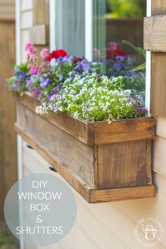 a window box with flowers in it and the words diy window box & shutters