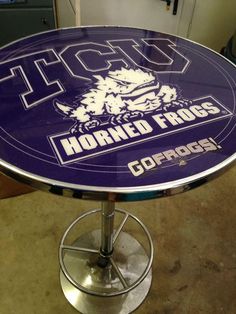 a round table with the words horned frogs on it