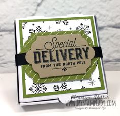 a card with the words special delivery from the north pole and a tag on it