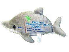 a stuffed dolphin is shown with the words, ripples to banana city beach florida on it