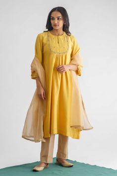 Yellow kurta with zari thread, sequin, bead embroidered yoke in leaf pattern. Paired with inner, beige pant and gold fringe lace bordered dupatta. - Aza Fashions Yellow Kurta, Gold Fringe, Beige Pants, Silk Brocade, Lace Border, Silk Embroidery, Pants Pattern, Pant Set, Set For Women