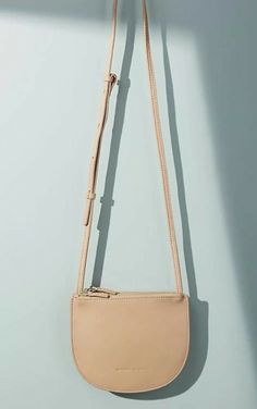 Functional, modern styles that are delicate and edgy at once. Each of their luxurious bags is inspired by a biker-meets-bohemian sensibility and full of subtle, fuss-free yet feminine details. Leather Three zip outer pockets Zip closure Approximate Dimensions 7"H, 8"W, 2"D 20-22" adjustable strap drop Casual Shoulder Bag For Everyday, Elegant Spring Shoulder Bag In Soft Leather, Elegant Soft Leather Shoulder Bag For Spring, Elegant Soft Leather Bag For Spring, Spring Soft Leather Rectangular Shoulder Bag, Spring Modern Shoulder Bag With Phone Pocket, Rectangular Soft Leather Shoulder Bag For Spring, Spring Rectangular Soft Leather Shoulder Bag, Elegant Summer Shoulder Bag With Zipper Closure