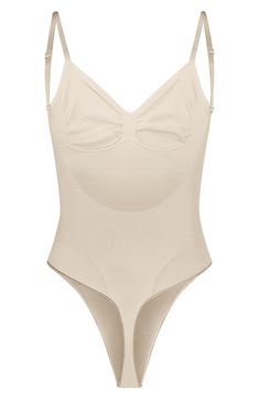 Sculpt your natural shape with a thong bodysuit that holds in your core and supports your chest flawlessly even in backless outfits. Sweetheart neck Adjustable straps 82% nylon, 18% spandex Machine wash, line dry Made in Turkey