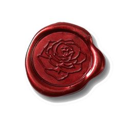 a wax stamp with a rose on it