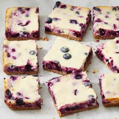 blueberry cheesecake bars are cut into squares